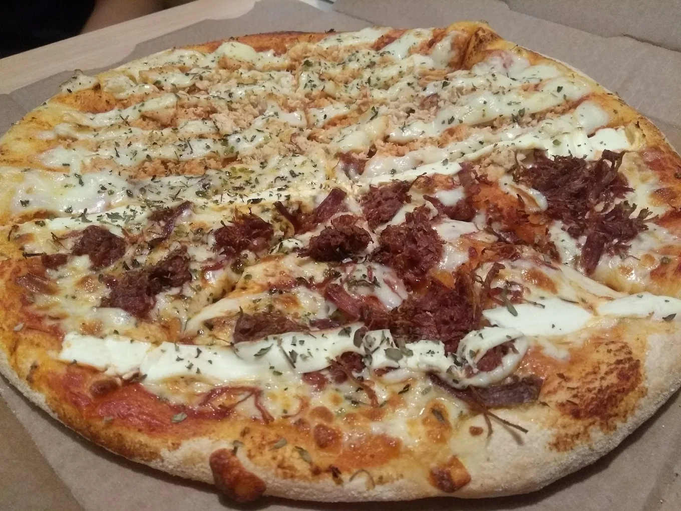 Foto de pizza avaliada por cliente