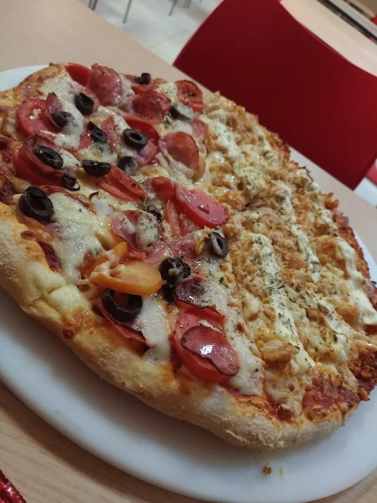 Foto de pizza avaliada por cliente