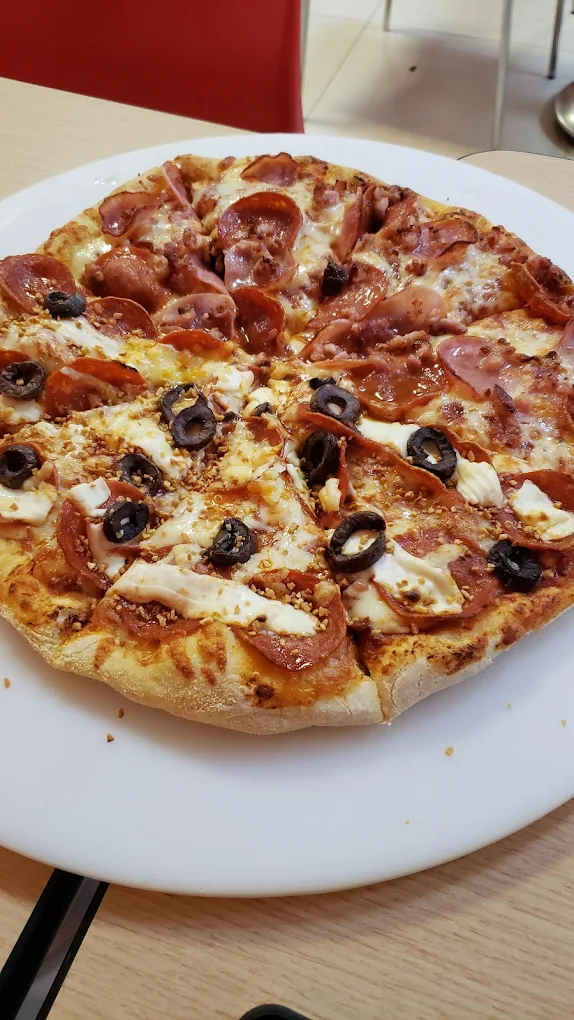 Foto de pizza avaliada por cliente